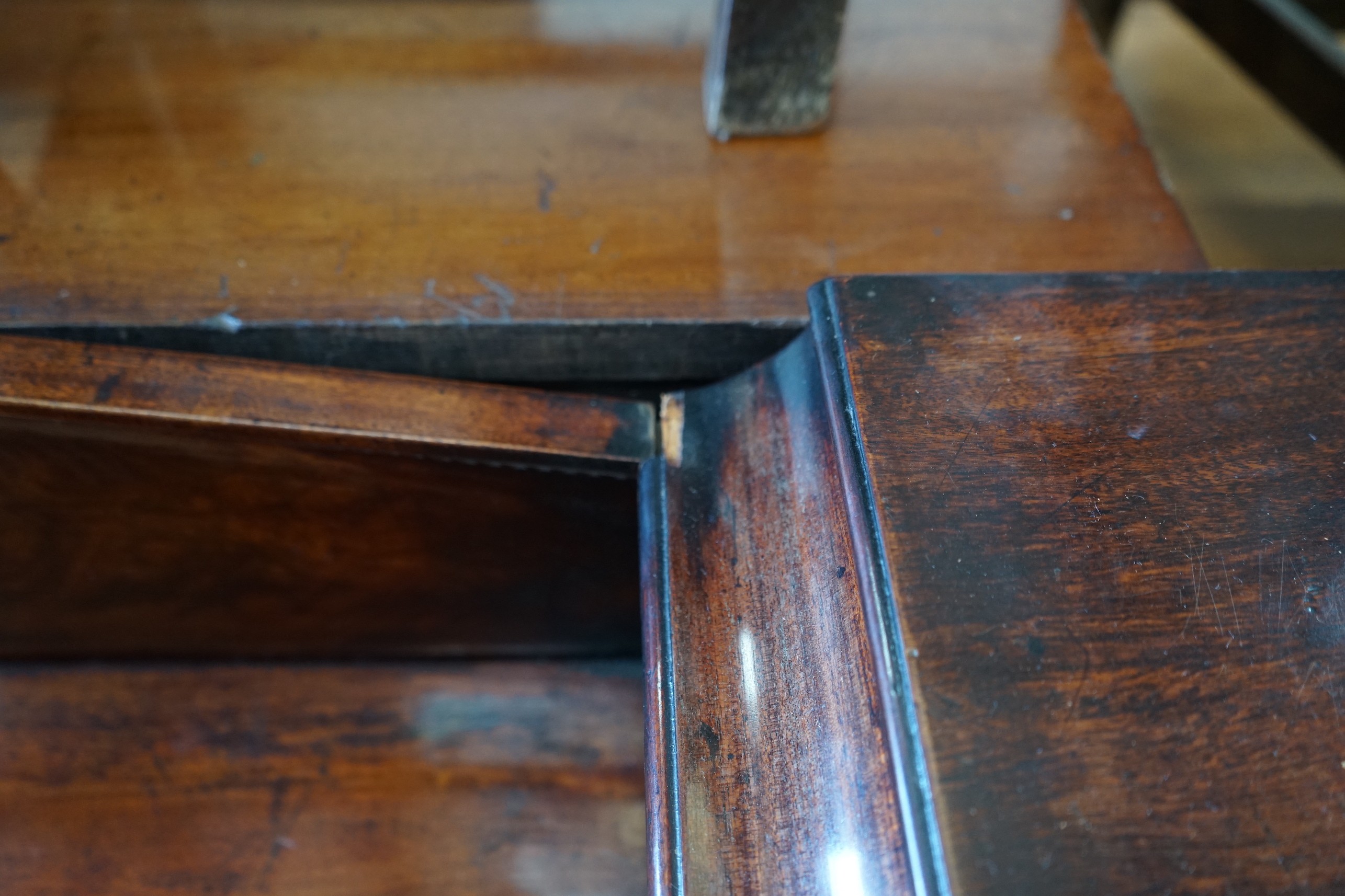 A Regency carved mahogany pedestal sideboard, length 186cm, depth 54cm, height 115cm